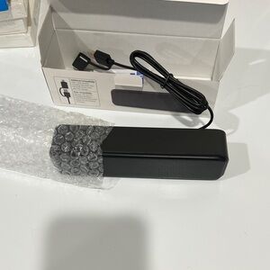 Black Portable Speaker. Mini soundbar with bass effect.